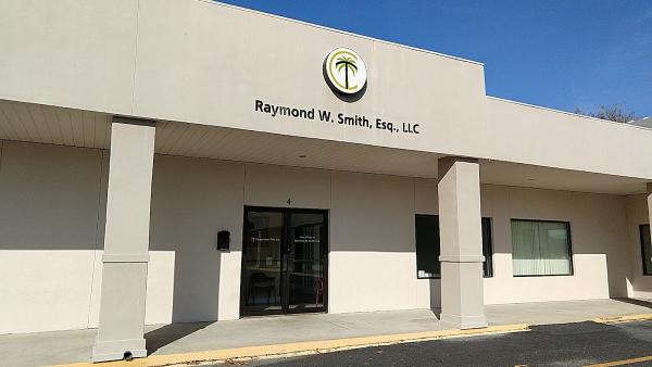 Raymond W. Smith Esq