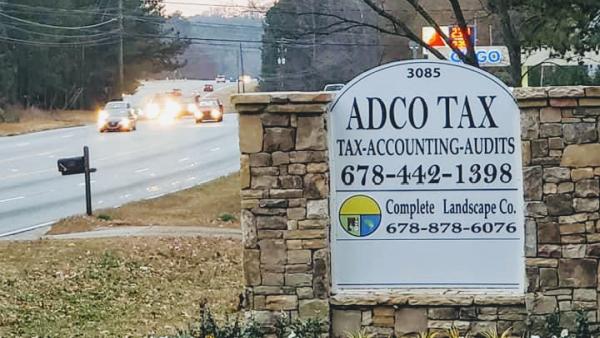 Adco TAX Services INC