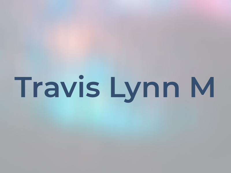 Travis Lynn M